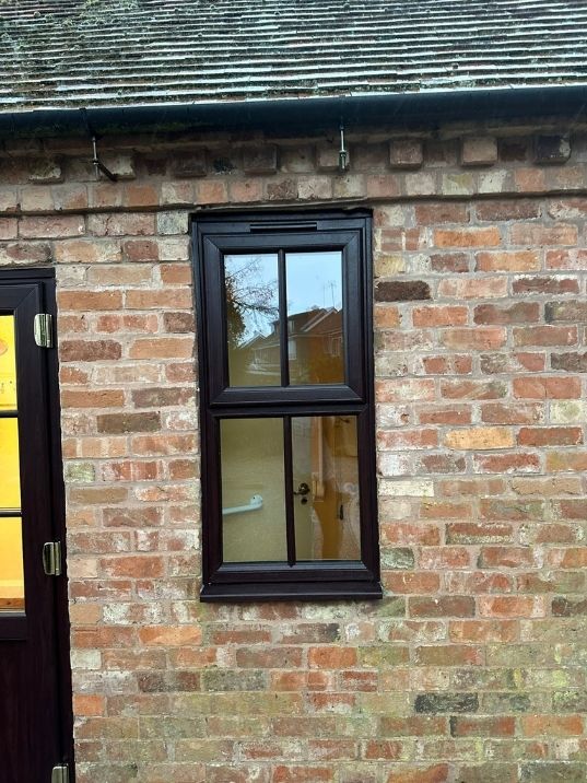 Hill Parish Hall case study, windows and doors